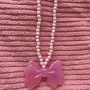Collier nœud rose pastel